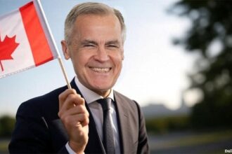 White male Mark Carney wearing a suit and waving a Canada flag.