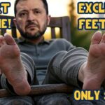 Ukraine President Volodymyr Zelensky sitting on a chair showing his feet.