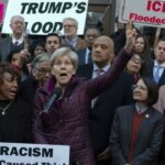 Democrats protesting against Donald Trump about Texas flood.