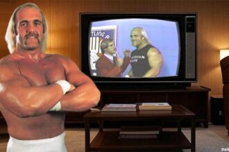 Hulk Hogan standing in front of an old TV in a 1980s living room.