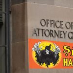 Spirit Halloween signs in front of Pam Bondi's Attorney General office in Washington.