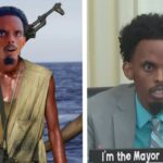 Somali black man Minneapolis mayor candidate Omar Fateh wearing a suit.
