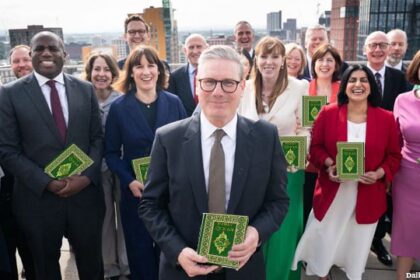UK Labour Party members men and women standing for a group photo.