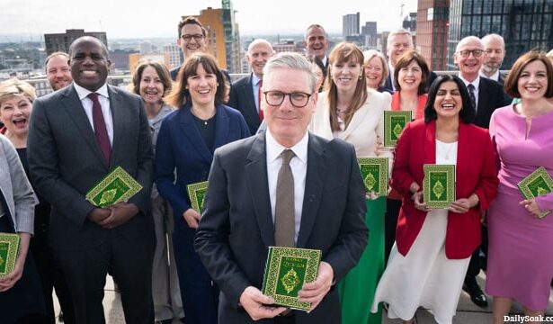 UK Labour Party members men and women standing for a group photo.