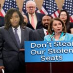 Male and female Democrats in Congress standing behind podium to protest Trump's census.