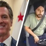 California Governor Gavin Newsom standing next to Illegal Indian Trucker Harjinder Singh.