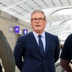 ICE agents arresting British criminal illegal alien UK Prime Minister Keir Starmer.