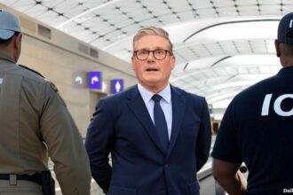 ICE agents arresting British criminal illegal alien UK Prime Minister Keir Starmer.