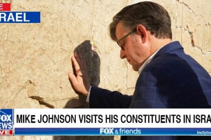 Republican Mike Johnson touching the Wailing Wall in Israel.
