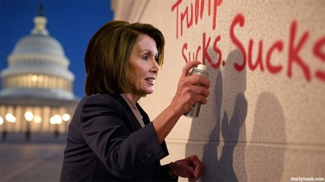 Nancy Pelosi spray-painting a wall of the Capitol Building.