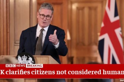 UK Prime Minister Keir Starmer giving a speech behind a podium on stage.