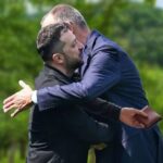 Ukraine President Zelensky hugging German Chancellor Friedrich Merz.