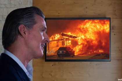 Gavin Newsom watching footage of the California wildfires.