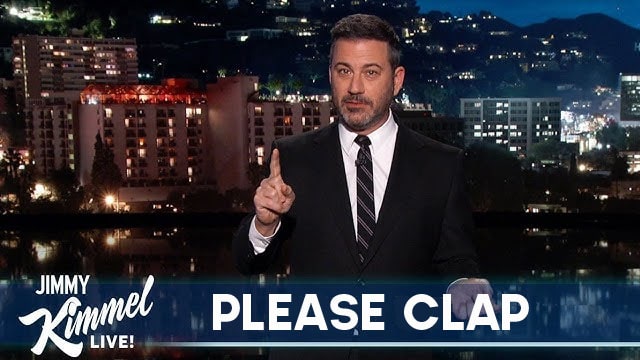 Jimmy Kimmel in a suit on his late night program speaking about Charlie Kirk.