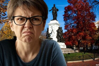 Angry, white liberal woman wearing eyeglasses standing in Washington DC after president Trump cleaned it up.
