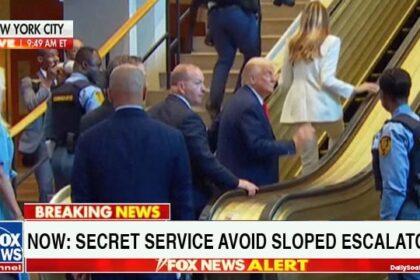 Secret Service agents watching as President Donald Trump gets stuck on sloped escalator in UN building.