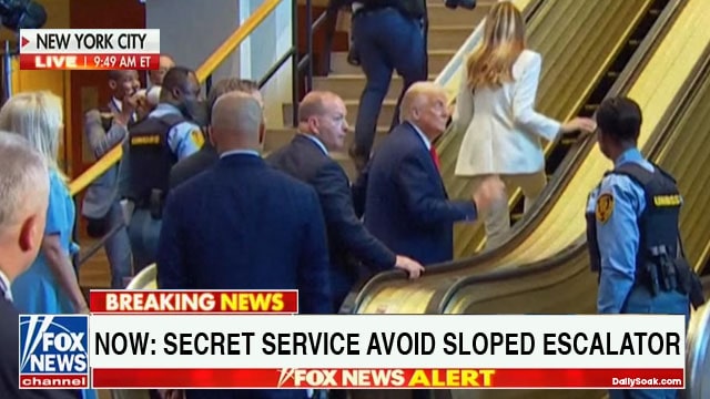 Secret Service agents watching as President Donald Trump gets stuck on sloped escalator in UN building.