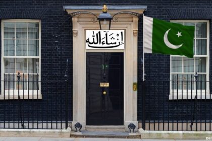 UK Prime Minister's office on 10 Downing Street with a green Pakistan flag in front.