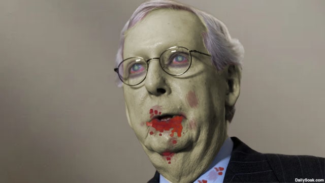 Congress Senator Mitch McConnell with blood dripping from his mouth dressed as a zombie for Halloween.