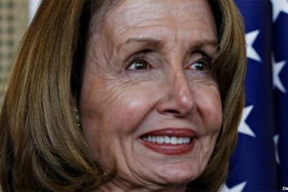 Nancy Pelosi closeup smiling painfully due to all the Botox hiding the wrinkles.