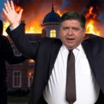 Governor JB Pritzker standing in front of his Illinois governor's mansion on fire.