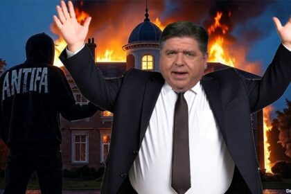 Governor JB Pritzker standing in front of his Illinois governor's mansion on fire.