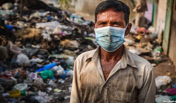 Indian man wearing face mask surrounded by trash and poop in dirty India street.