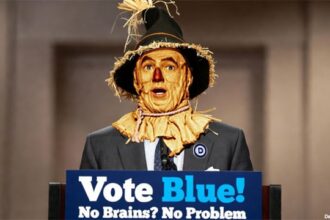 The Scarecrow from the Wizard of Oz wearing a suit and tie standing behind a podium in a Democrat campaign.