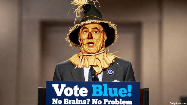 The Scarecrow from the Wizard of Oz wearing a suit and tie standing behind a podium in a Democrat campaign.