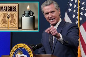 California Governor Gavin Newsom speaking behind a podium on wildfires.