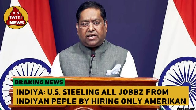 India official giving speech at podium regarding Indian H-1b visas.