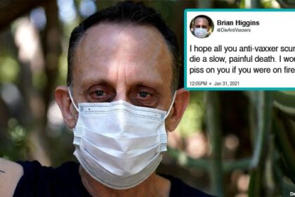 COVID Vaccinated man wearing a medical mask angry at the unvaccinated.