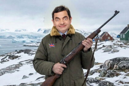 UK British character Mr. Bean wearing a parka and holding a gun in Greenland.