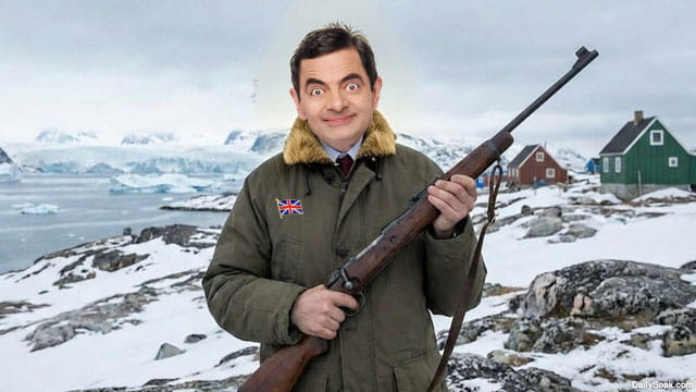 UK British character Mr. Bean wearing a parka and holding a gun in Greenland.