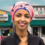 Black female Congresswoman Ilhan Omar standing in front of Somali daycare center.