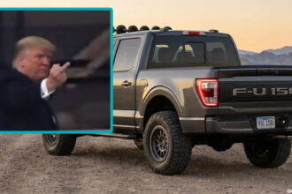 President Donald Trump giving a middle finger to a heckler at a Ford auto plant.