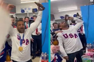 FBI Director Kash Patel drinking beer inside locker room with Team USA male hockey players.