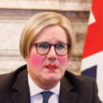 UK Prime Minister Keir Starmer wearing women's makeup and a blonde wig.