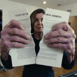 Nancy Pelosi in Capitol gym ripping State of the Union address papers.