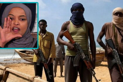 Somali pirates holding guns on a beach with an image insert of Somali Congresswoman Ilhan Omar.