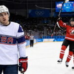 U.S. Men's Hockey team playing on ice against Canada.