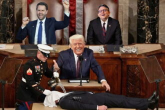 President Donald Trump, JD Vance, and Mike Johnson on stage for State of the Union speech.