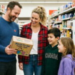 Canada family inside of a Costco supermarket holding a box with MAID on it.