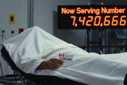 Canadian man lying on a gurney under a white sheet inside of a Canada hospital emergency room.