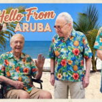 Congress members on a beach.