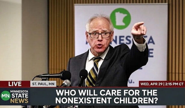 Tim Walz giving a speech behind podium on FBI raids on Somali daycare centers.