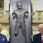 King Charles and President Trump sitting inside Oval Office with UK Prime Minister in carbonite behind them.