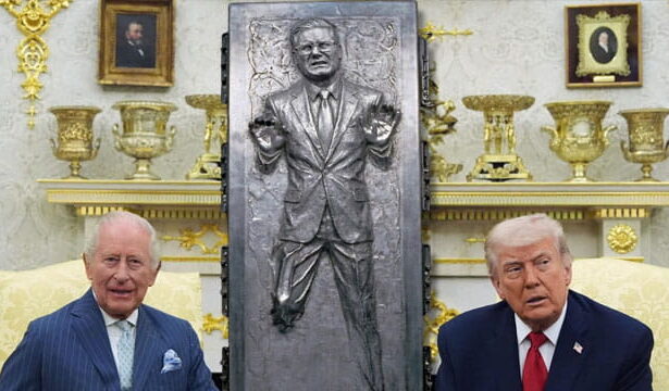 King Charles and President Trump sitting inside Oval Office with UK Prime Minister in carbonite behind them.