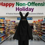 UK Easter Bunny wearing a full black burka.