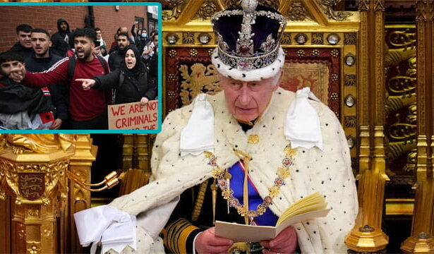 UK King Charles sitting on a throne giving a speech.
